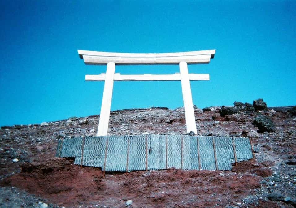 A large torii gate standing close to the 8th rest stop